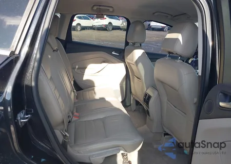 2015 Ford Escape Titanium z USA, uszkodzony, nr VIN 1FMCU0J98FUA32741